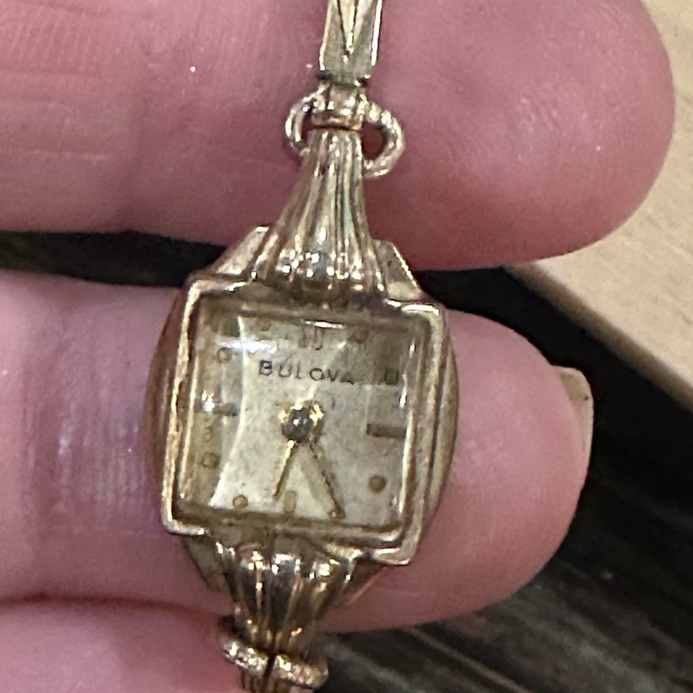 10k gold fill Buliva gold face of a watch.